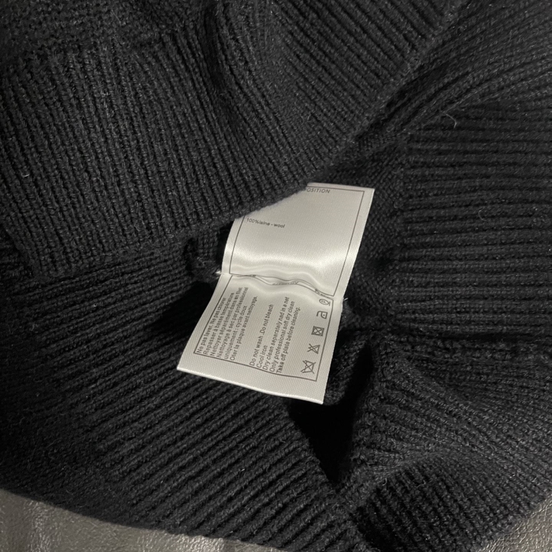 Ch**el sweaters
